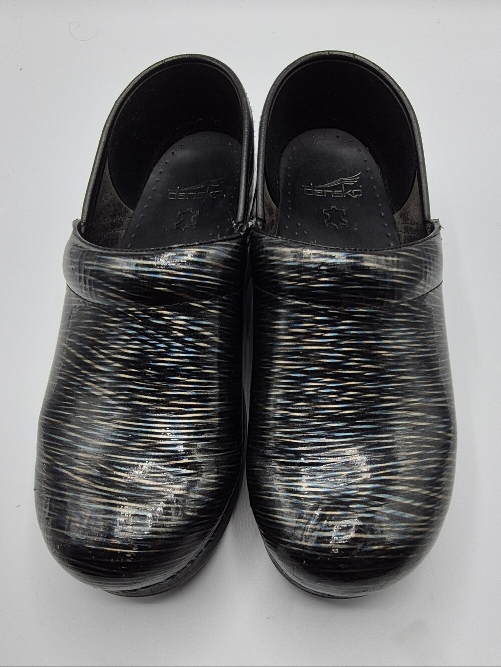 Dansko Black Multicolor Patterned Clogs